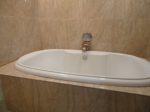 Combined shower/tub, hair dryer, towels, soap