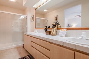 Combined shower/bathtub, hair dryer, towels, soap - Home Away From Home in Snowcreek V Resort (Mammoth Lakes)