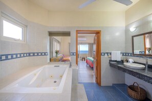Shower, jetted bath, hair dryer, towels