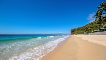 On the beach, sun loungers