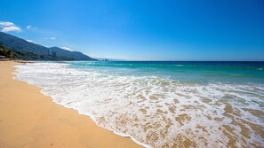 On the beach, sun-loungers