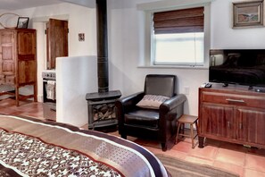 1 habitación, tabla de planchar con plancha, wifi y ropa de cama 