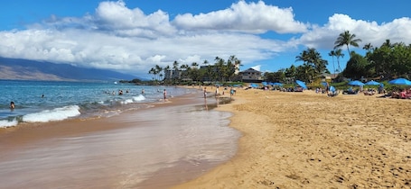 Beach nearby. Across from Kamaole 2 Beach, concrete building, well maintained.