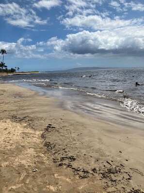 On the beach, sun loungers, beach towels