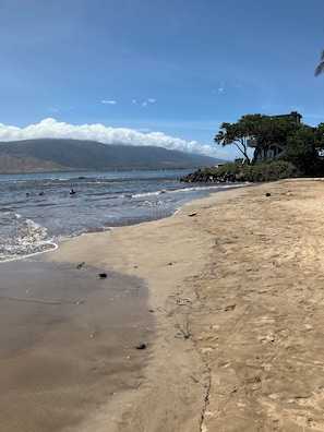 On the beach, sun-loungers, beach towels