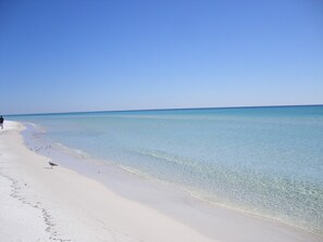 A beach with clear turquoise water and white sand. - 'The Great Escape'...Private Pool...Beach cottage...Steps to Beach! (Destin)