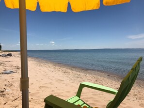 On the beach, sun-loungers, beach towels