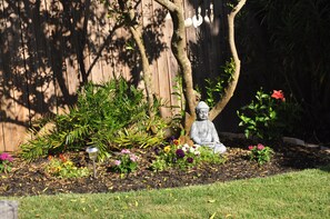 Tropical gardens, and mature trees.