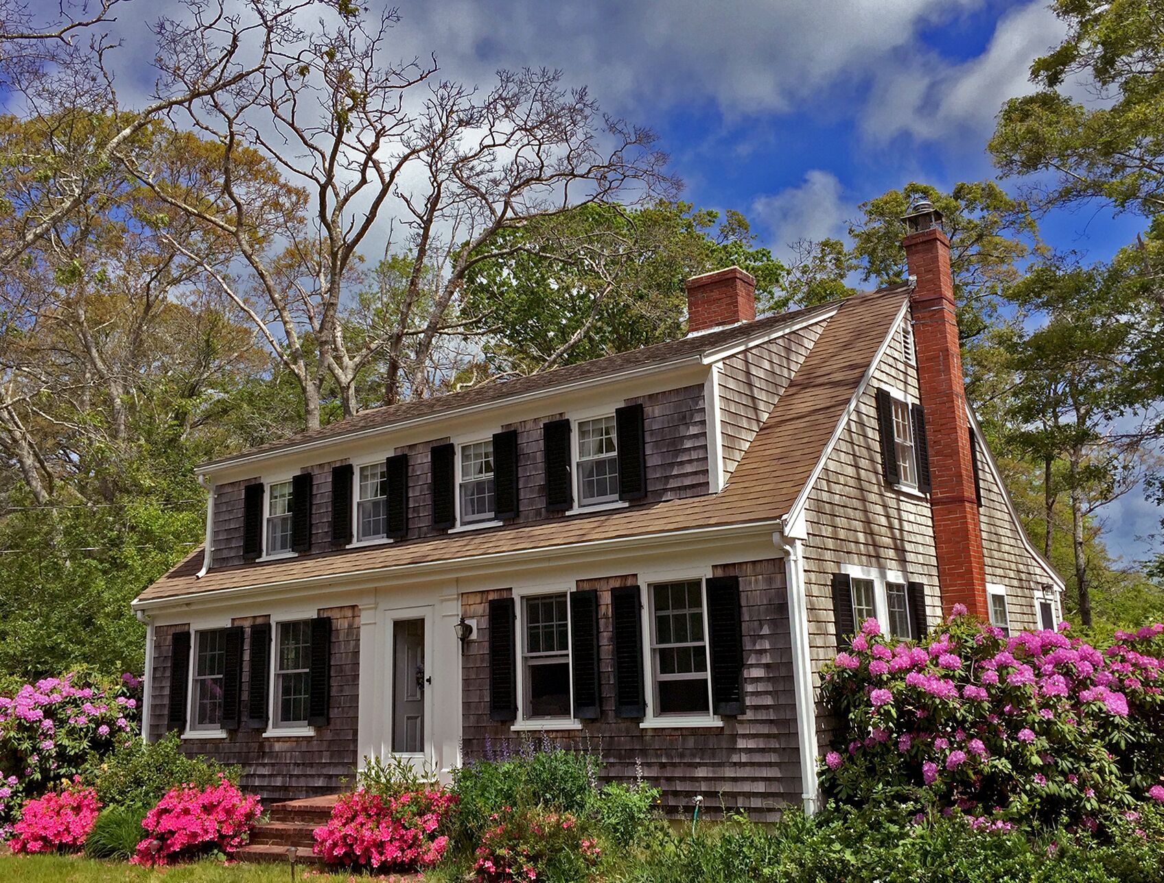 “Twin Oaks” south facing Full Cape Cod style home. Built 1930’s.