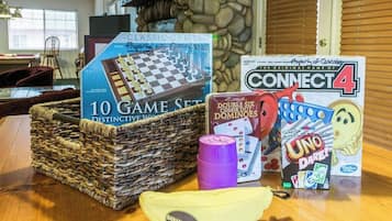 Enjoy family game nights in this cozy dining area with a selection of board games and a convenient snack station.