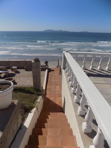 Spacious Oceanfront home with private access to the beach in a gated community.