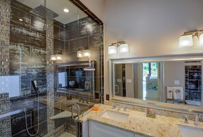 Shower, jetted tub, hair dryer, towels