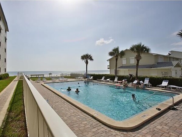 Outdoor pool, a heated pool - OCEANFRONT!! 2024 Luxuriously Renovated & Prof Decorated Condo on No Drive Beach (New Smyrna Beach)