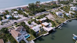 A coastal residential area with houses, a marina, and a beach. - Wonderful Canal Front Condo! See Manatees Right From Your Doorstep!Cabana #10 (Longboat Key)