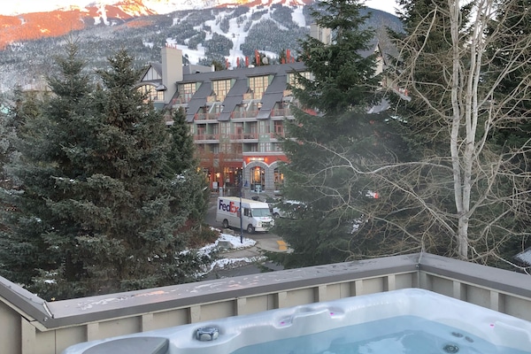 Hot tub with views of whistler mountain
Beginning of village stroll below.