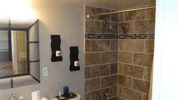 Combined shower/bathtub, hair dryer, towels, soap