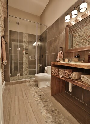 Combined shower/tub, hair dryer, towels, soap