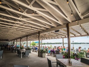 Outdoor dining - Cozy Okoboji Vacation Home At Bridges Bay Resort - backs to pool! #118 (Arnolds Park)