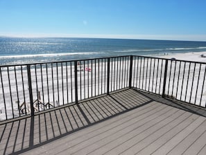 On the beach, sun-loungers