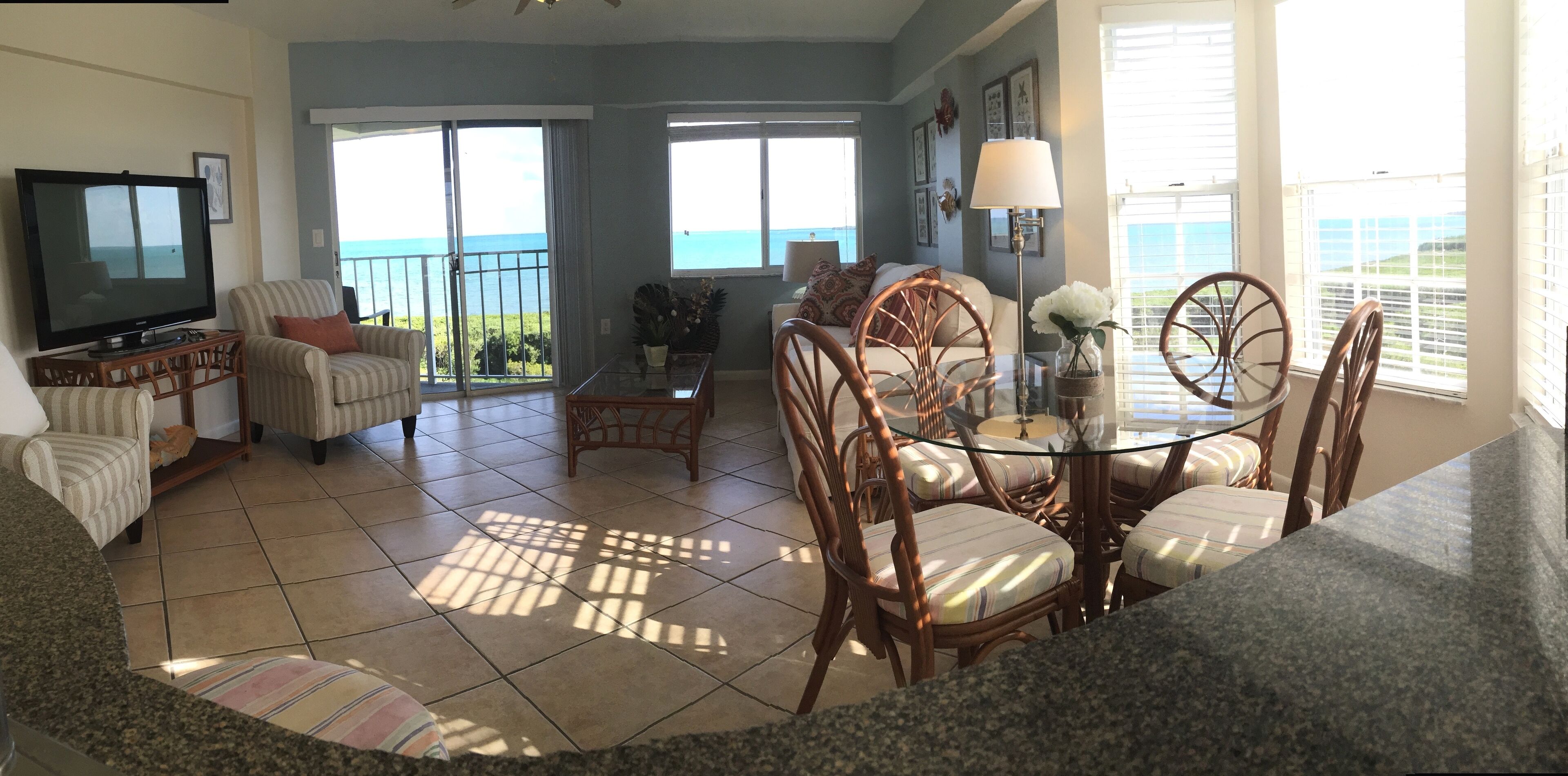 Blue Water Views Living Room and Dining Area