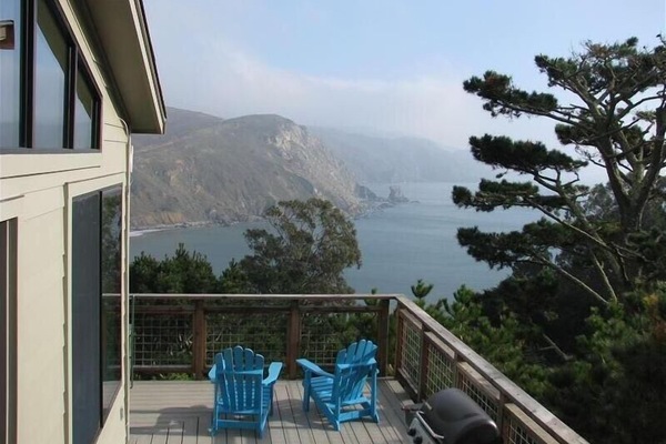 Entrance to house with wrap around deck and endless ocean views