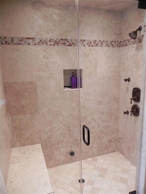 Combined shower/tub, hair dryer, towels, soap