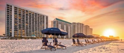 On the beach, sun loungers, beach towels