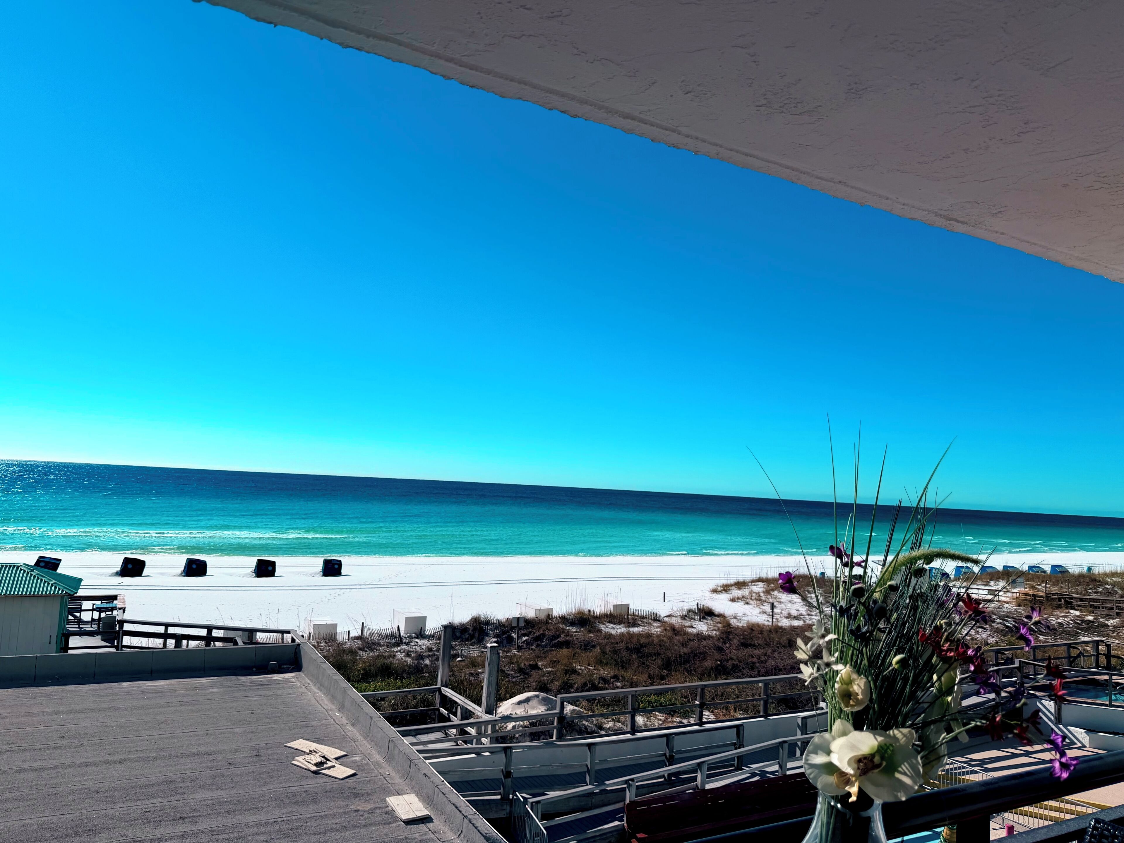 On the beach, sun-loungers, beach towels