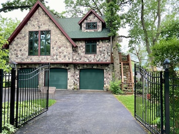 Street/ Driveway view of Coach House