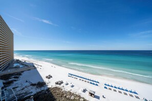 On the beach, sun-loungers