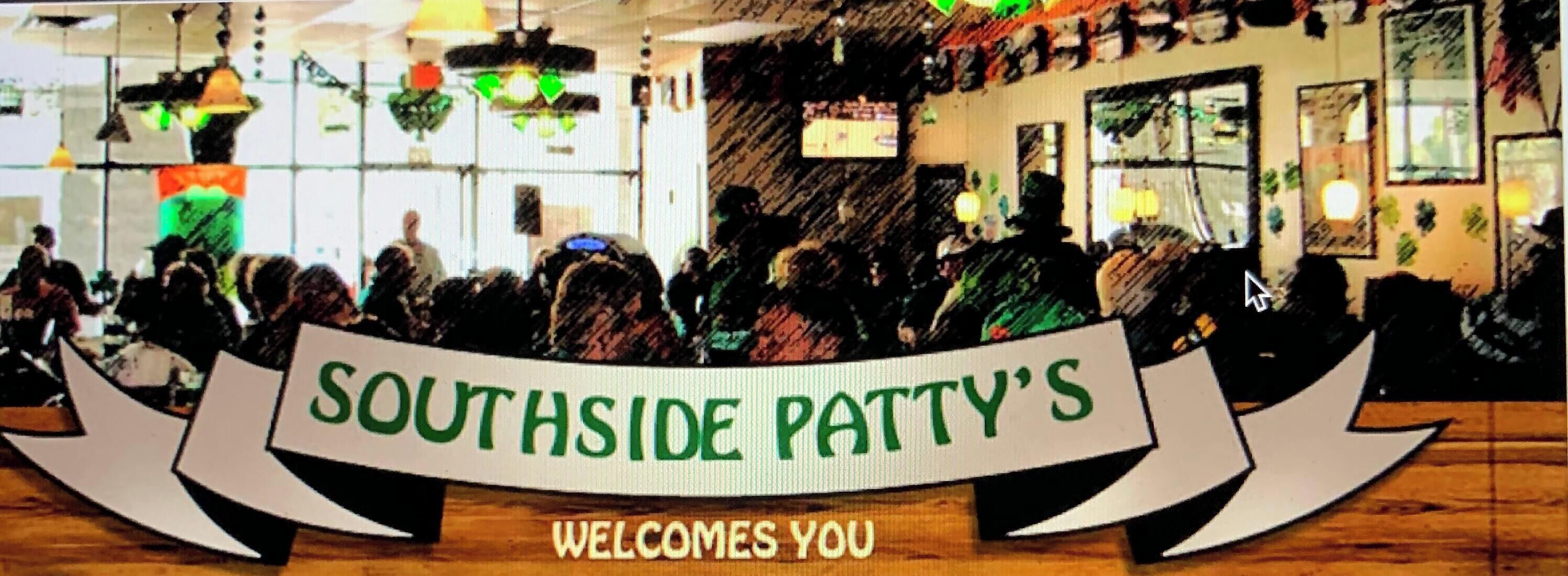 A restaurant interior with a banner reading "Southside Patty's" and a welcoming message.