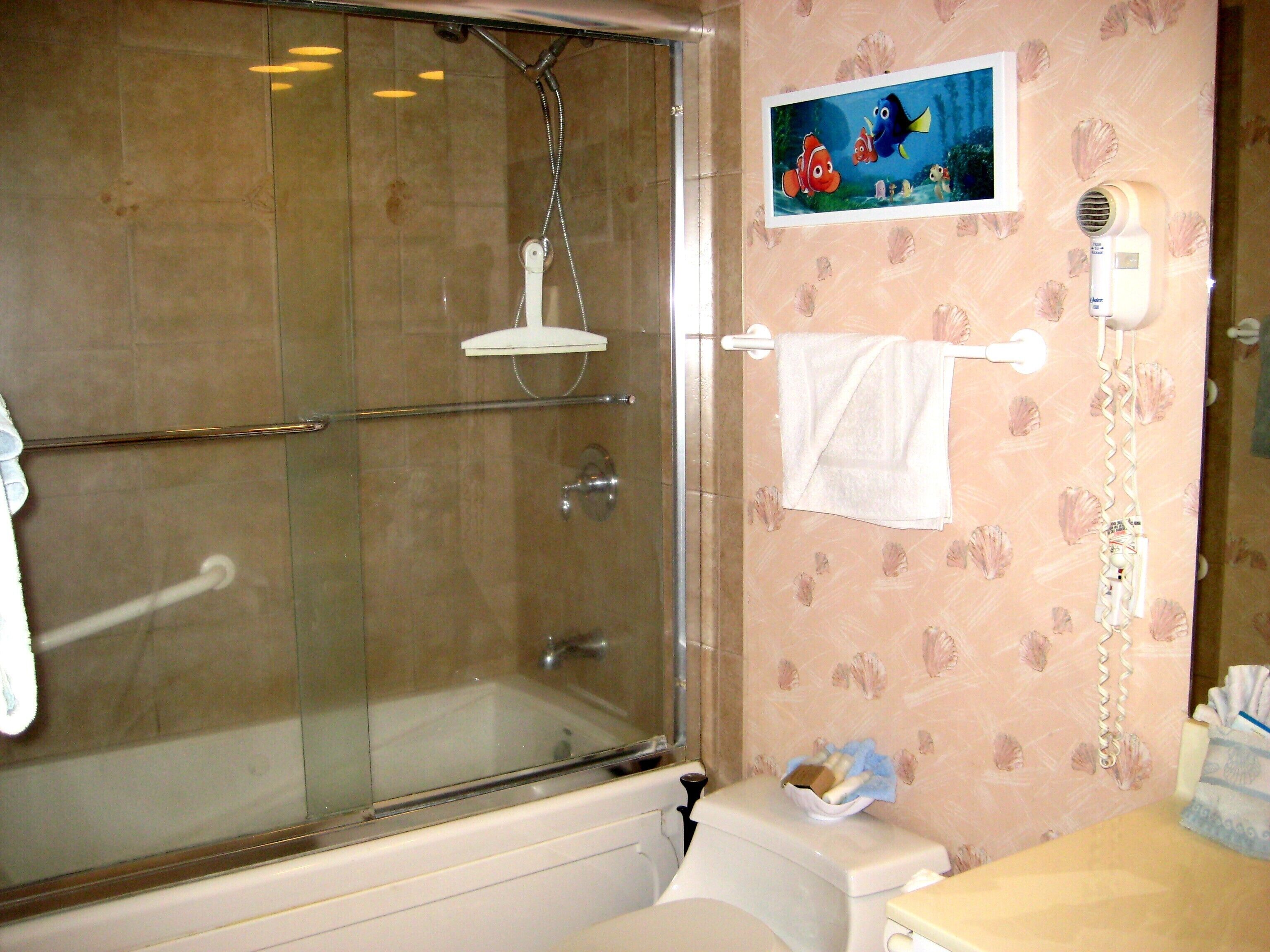 Shower, jetted tub, hair dryer, towels