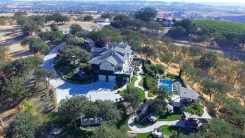 Enjoy a serene retreat surrounded by lush gardens and a vineyard.