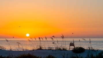 On the beach, sun loungers, beach towels