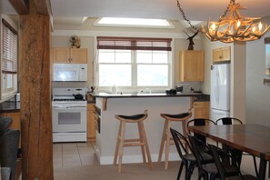 Fridge, microwave, oven, stovetop - Truly Ski In/Ski Out Condo!  Spacious- Sleeps 11!  Great Mountain Views! (Big Sky)