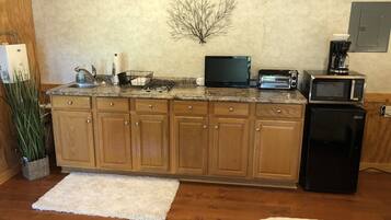 Fridge, microwave, stovetop, coffee/tea maker