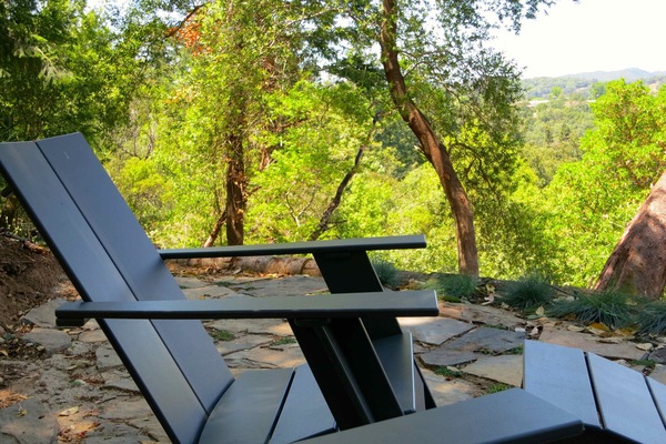 Seating area on the patio up behind the house. Stunning views & deep tranquility