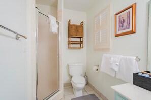 Shower, hair dryer, towels, soap