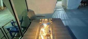 Beachfront condo on East Beach. Gulf, bay views. EV charger. Full kitchen, wifi.