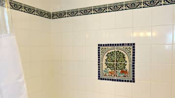 Combined shower/bathtub, hair dryer, towels, soap