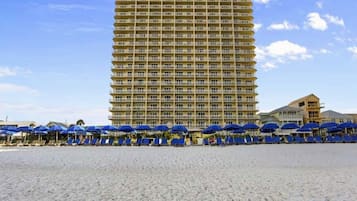 On the beach, sun loungers, beach towels