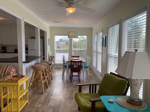 Enjoy meals in the open-plan living space with a kitchen and dining area.