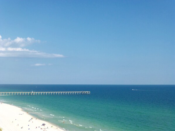 On the beach, sun-loungers