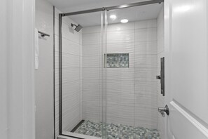 Combined shower/tub, hair dryer, towels, soap