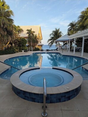 Outdoor pool, a heated pool - Coconut Bay Cayman Divers Delight (north west point)
