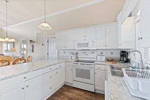 Fridge, microwave, oven, stovetop - "Beach Nuts" 5 Bedroom, 3 Bathroom Oceanfront home. (Holden Beach)