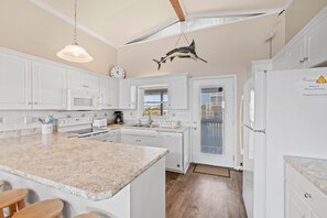 Fridge, microwave, oven, stovetop - "Beach Nuts" 5 Bedroom, 3 Bathroom Oceanfront home. (Holden Beach)