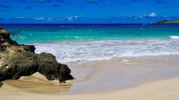 On the beach, sun-loungers, beach towels