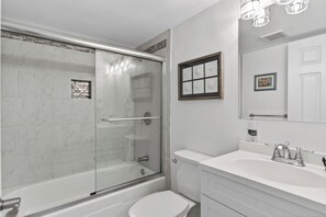 Combined shower/tub