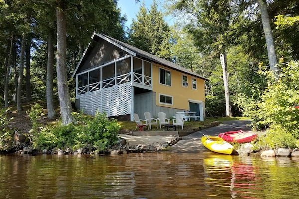 Private boat launch, small beach, and fire pit.